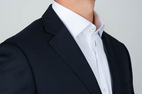 Tall spread collar with blazer from the side